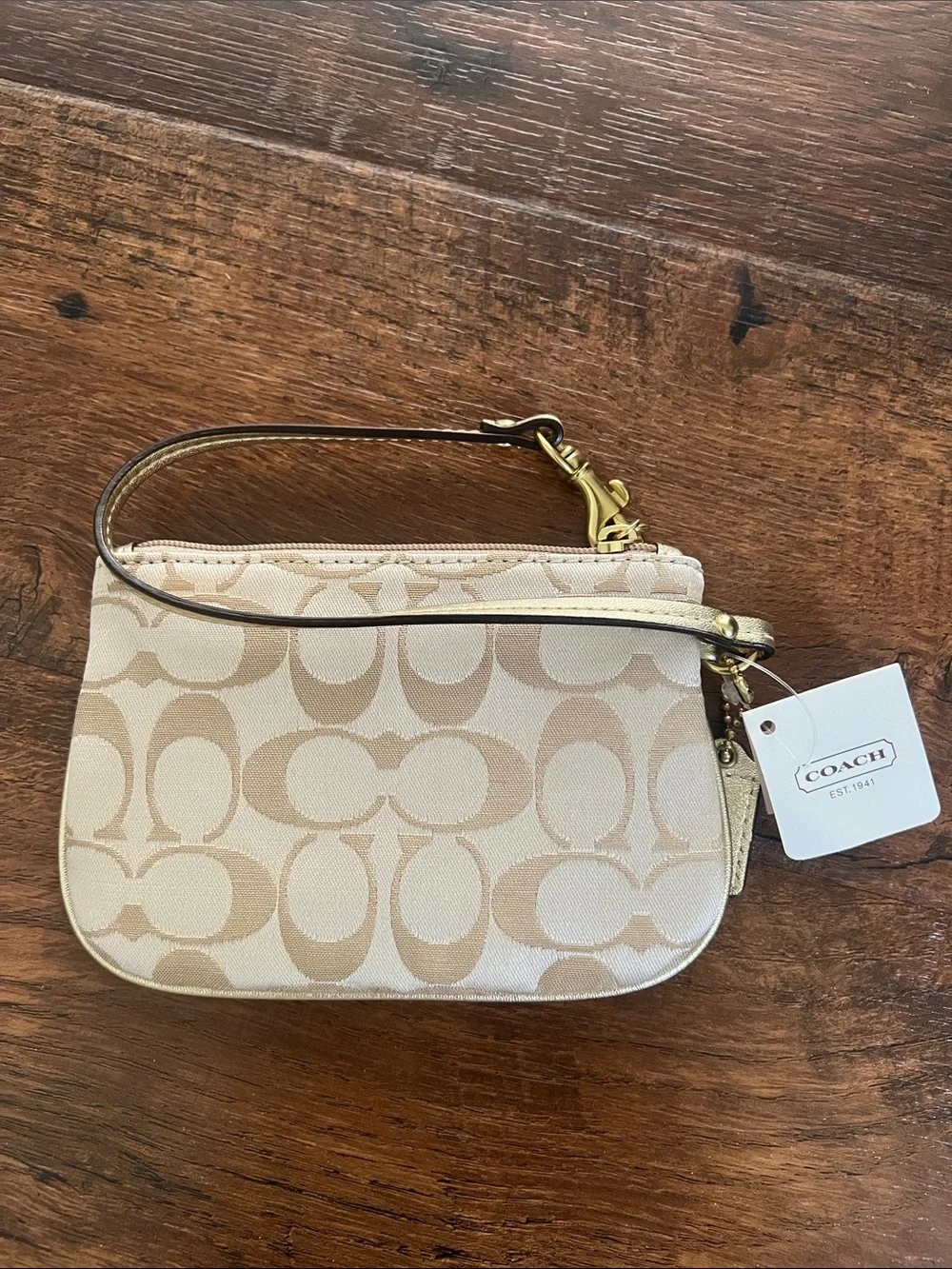 Coach Beige Signature Wristlet with Gold Patch